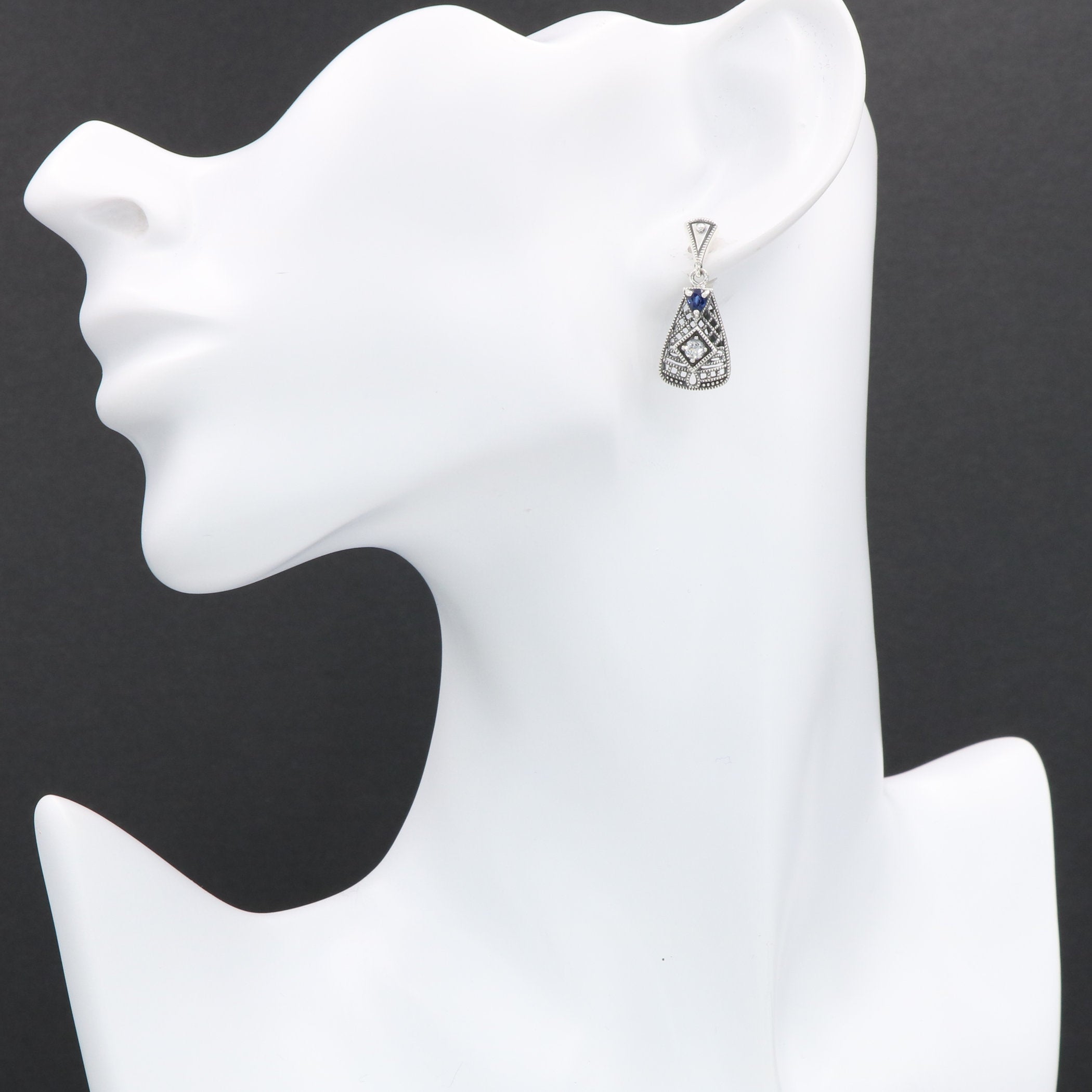 Detail view of Art Deco Blue Sapphire and White Topaz Filigree Earrings highlighting filigree detail
