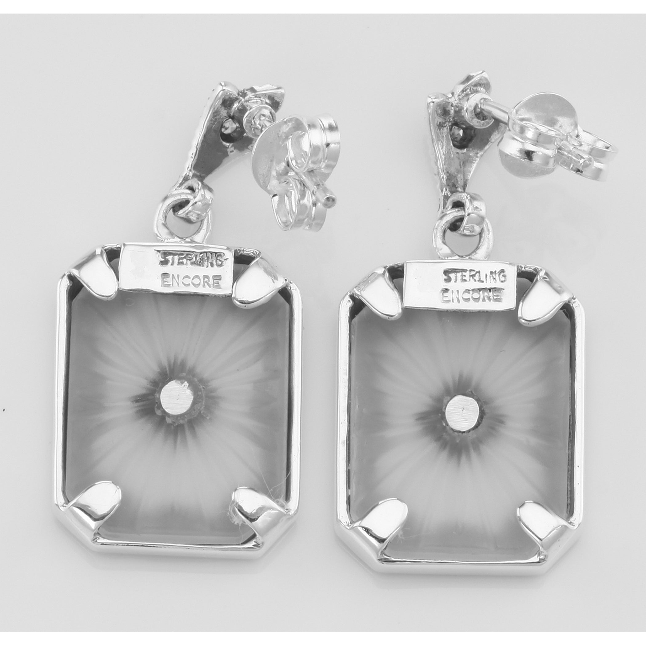 Back view of Art Deco Sunray Camphor Glass Sapphire Diamond Filigree Earrings showing 925 sterling silver hallmark and French wire hooks