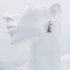 Detail view of Art Deco Style Genuine Ruby / White Topaz Filigree Earrings highlighting filigree detail