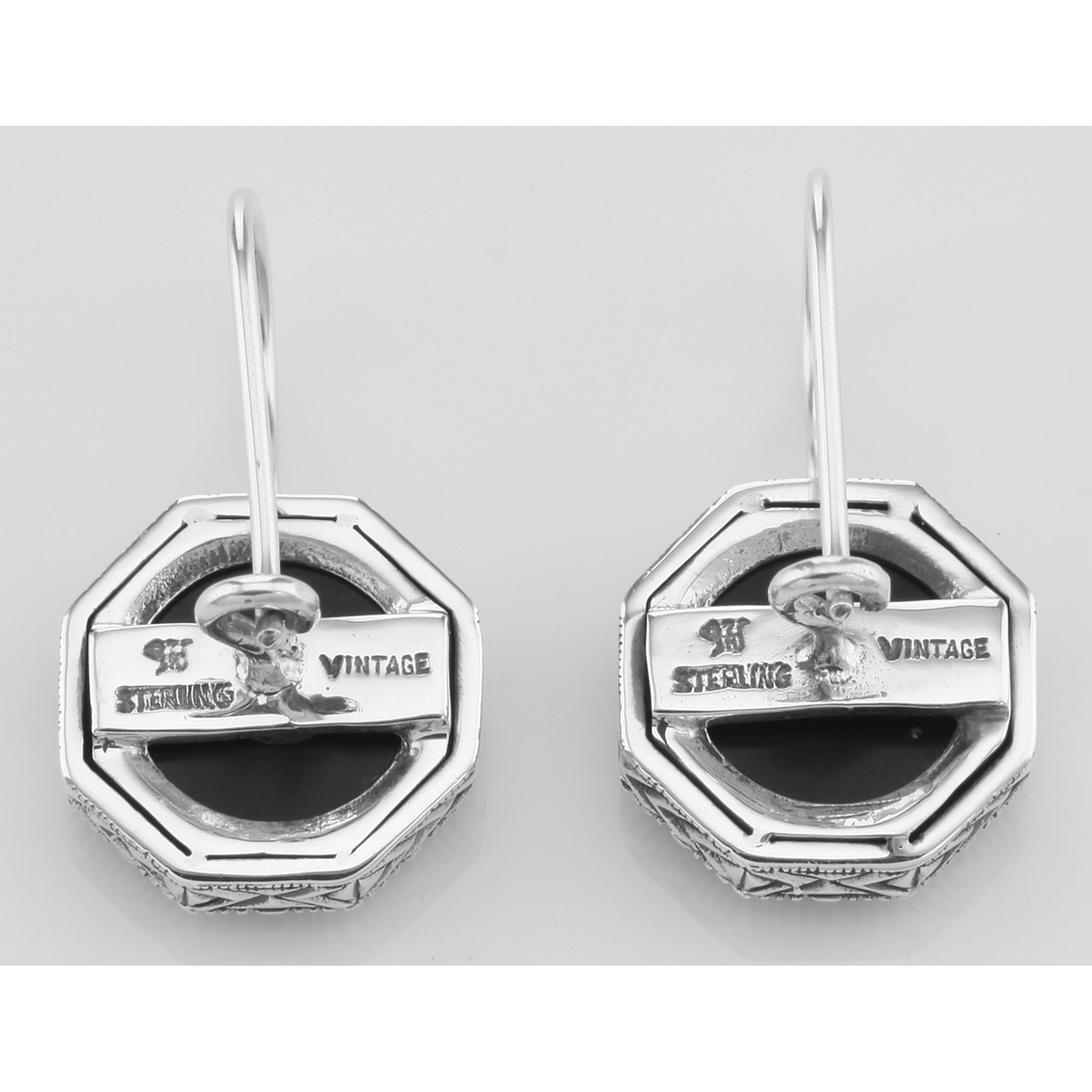 Back view of Unique Art Deco Black Onyx and White Topaz Filigree Earrings showing 925 sterling silver hallmark and French wire hooks