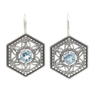 Art Deco hexagonal earrings, round blue topaz in open filigree lattice, milgrain frame, French wire hooks, sterling silver