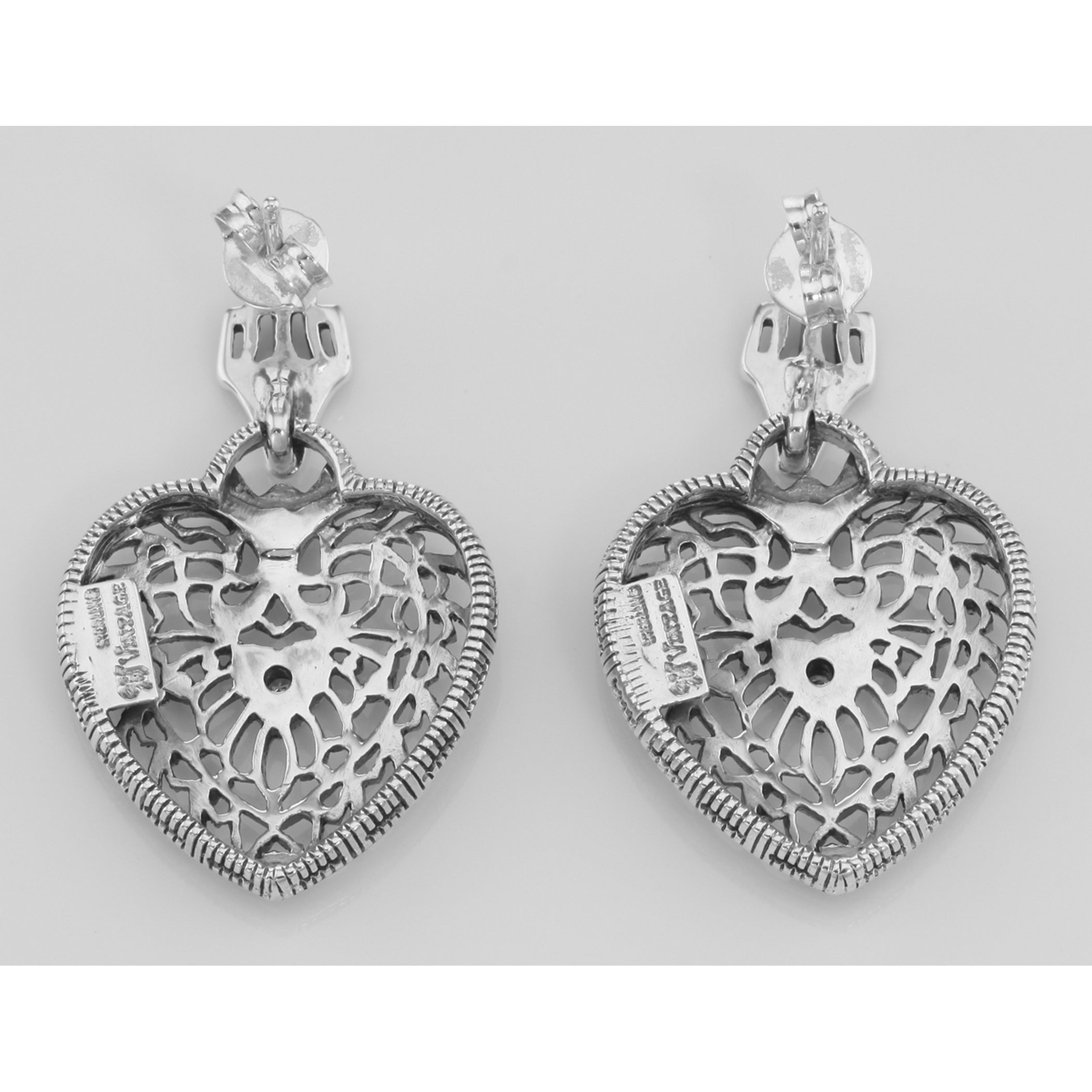 Back view of Victorian Style Diamond Filigree Heart Shaped Earrings showing 925 sterling silver hallmark and French wire hooks