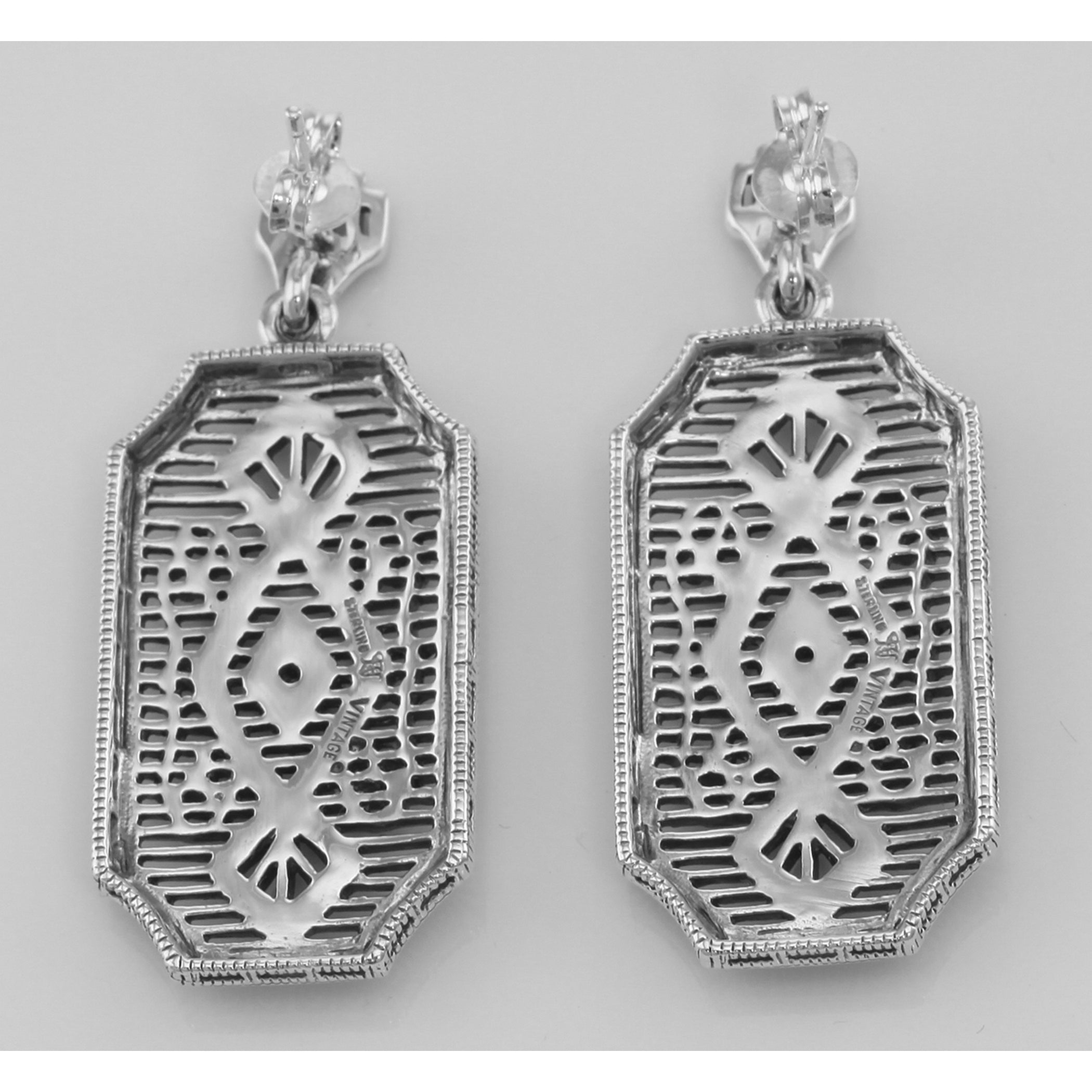 Back view of Diamond Filigree Drop Earrings showing 925 sterling silver hallmark and French wire hooks