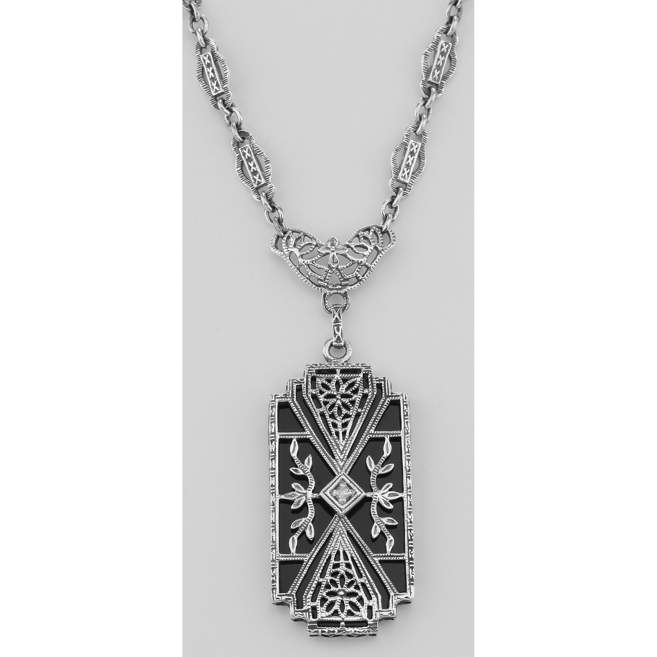 Detail view of Art Deco Style Black Onyx Filigree Diamond Necklace highlighting Diamond, Black Onyx