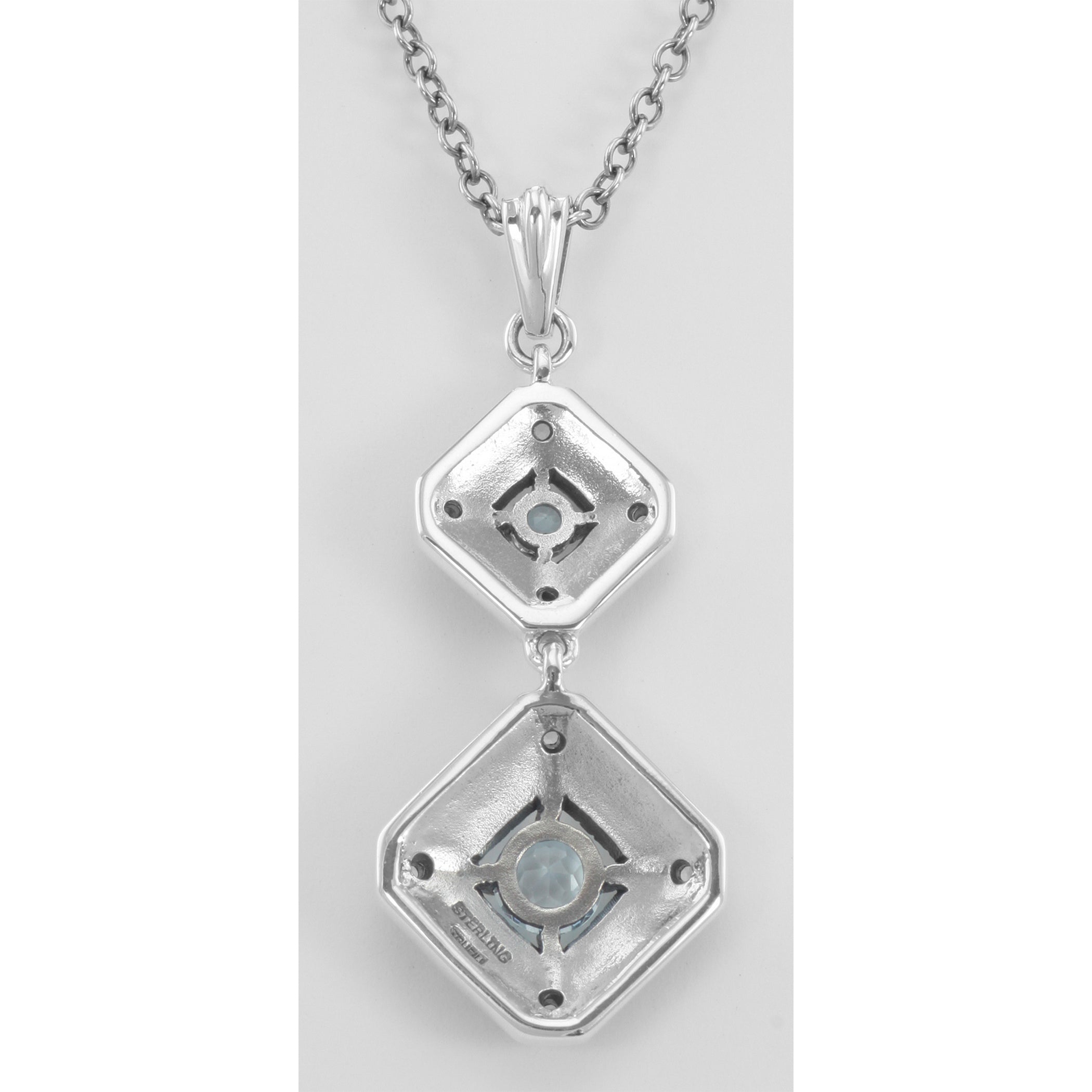Back view of Art Deco Style Genuine Blue Topaz and Filigree Necklace showing 925 sterling silver hallmark and spring ring cla