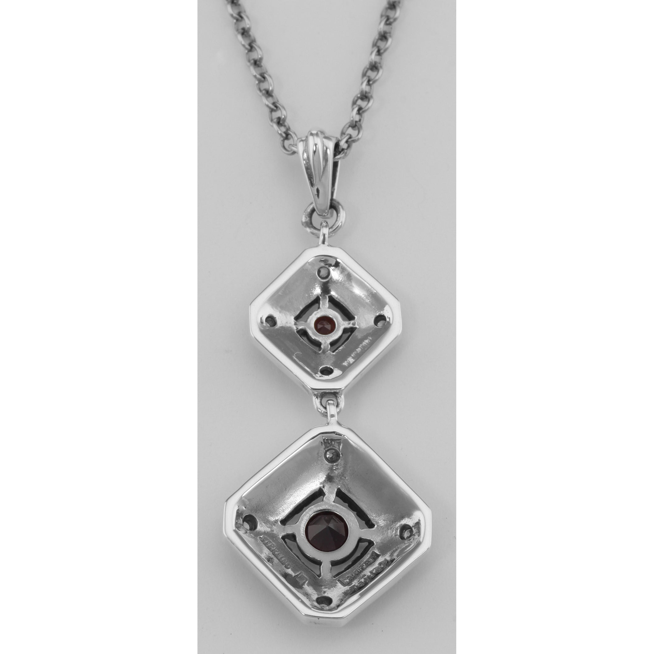 Back view of Art Deco Style Genuine Red Garnet and Filigree Necklace showing 925 sterling silver hallmark and spring ring cla