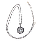 Back view of Art Deco Hexagon Filigree Blue Topaz Pendant Adjustable Chain showing 925 sterling silver hallmark and spring ri