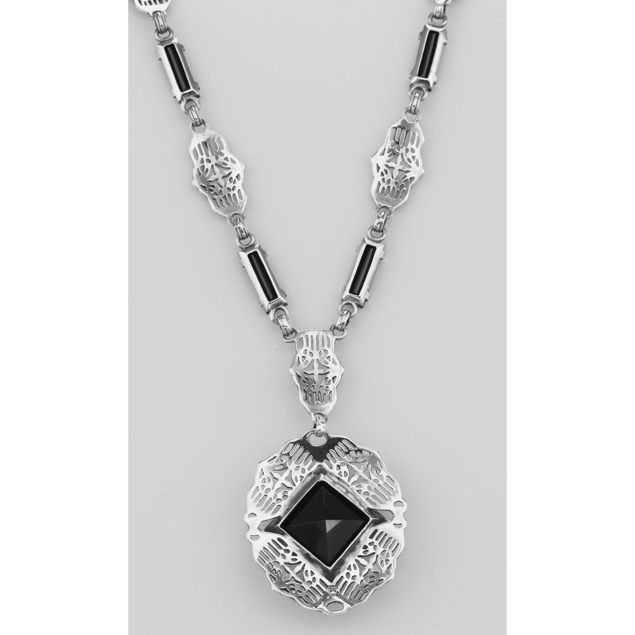 Back view of Unique Art Deco Black Onyx Filigree Necklace showing 925 sterling silver hallmark and spring ring clasp
