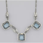 Back view of Art Deco Style 3 Gemstone Blue Topaz Filigree 17.5 Inch Necklace Sterling Silver showing 925 sterling silver hal