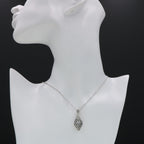 Detail view of Victorian Style White Topaz Filigree Pendant with Chain highlighting White Topaz