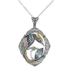 Filigree, Blue Topaz, sterling silver pendants, front view