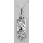 Back view of Art Deco Style Filigree Pendant w/ Blue Sapphire showing 925 sterling silver hallmark and spring ring clasp