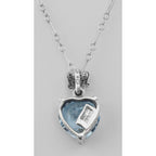 Back view of Filigree Heart Shaped Blue Topaz Pendant showing 925 sterling silver hallmark and spring ring clasp