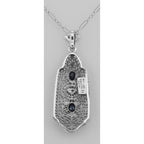 Back view of Art Deco Style Sapphire and Diamond Filigree Pendant showing 925 sterling silver hallmark and spring ring clasp