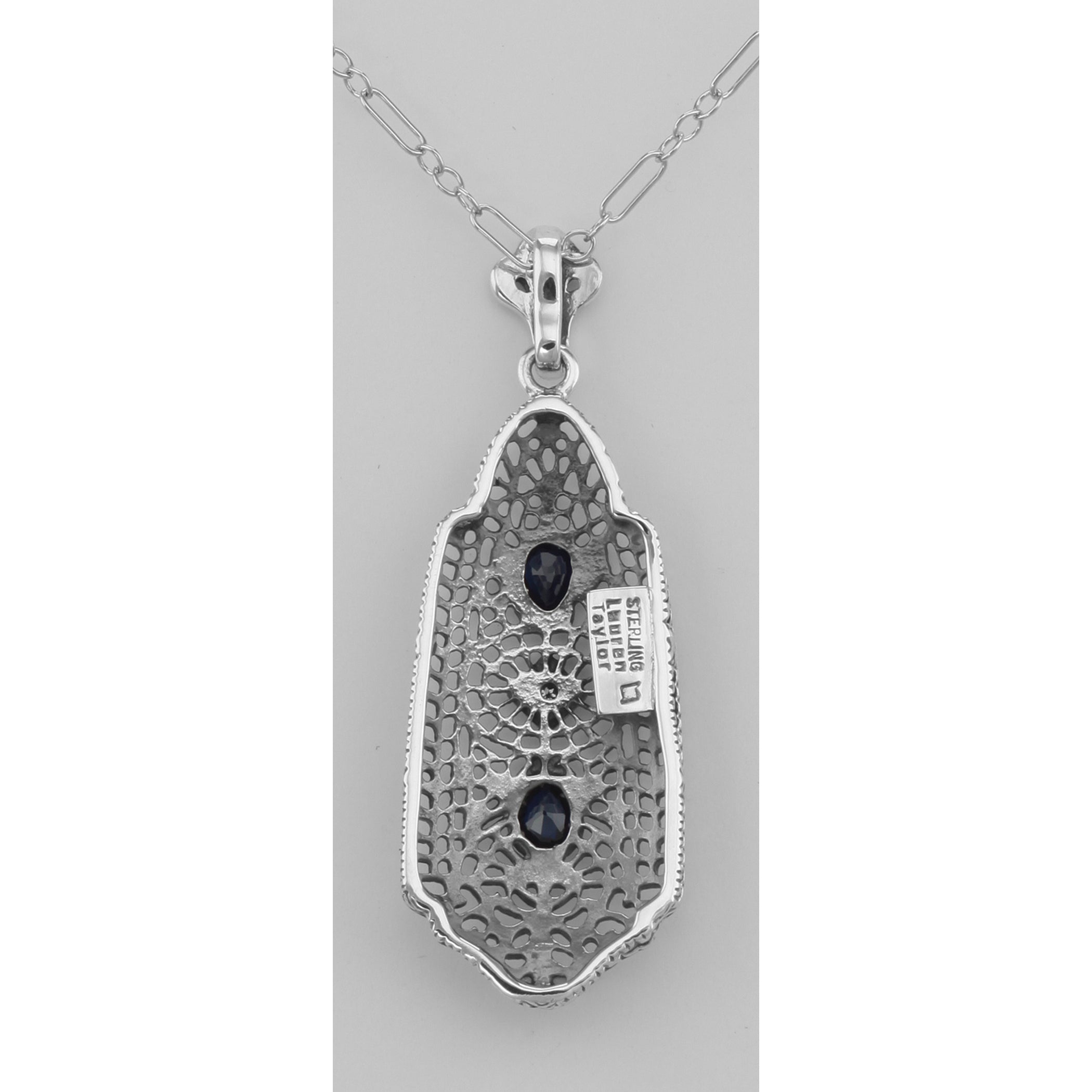 Back view of Art Deco Style Sapphire and Diamond Filigree Pendant showing 925 sterling silver hallmark and spring ring clasp
