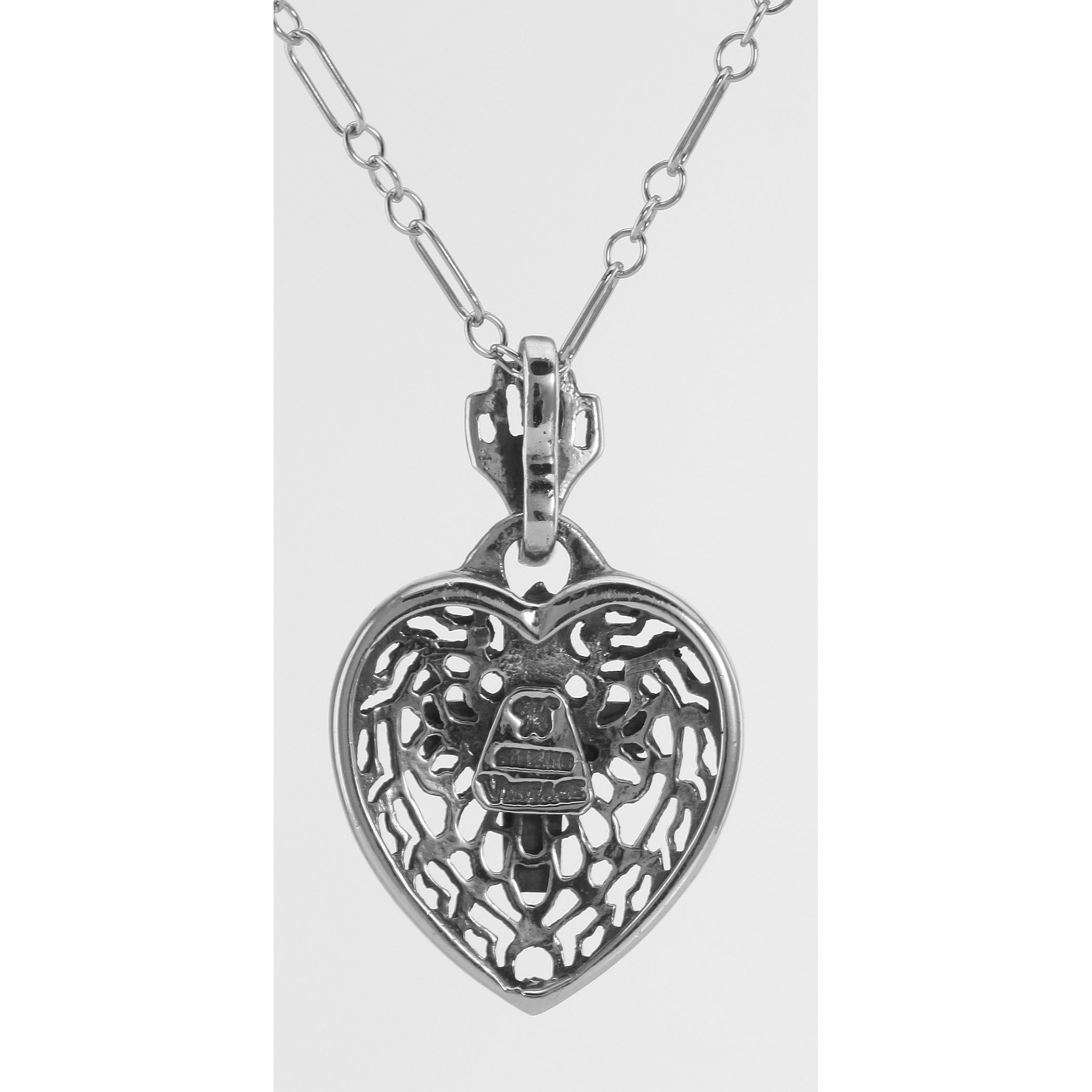 Back view of Filigree Heart Pendant with Cross and Chain showing 925 sterling silver hallmark and spring ring clasp