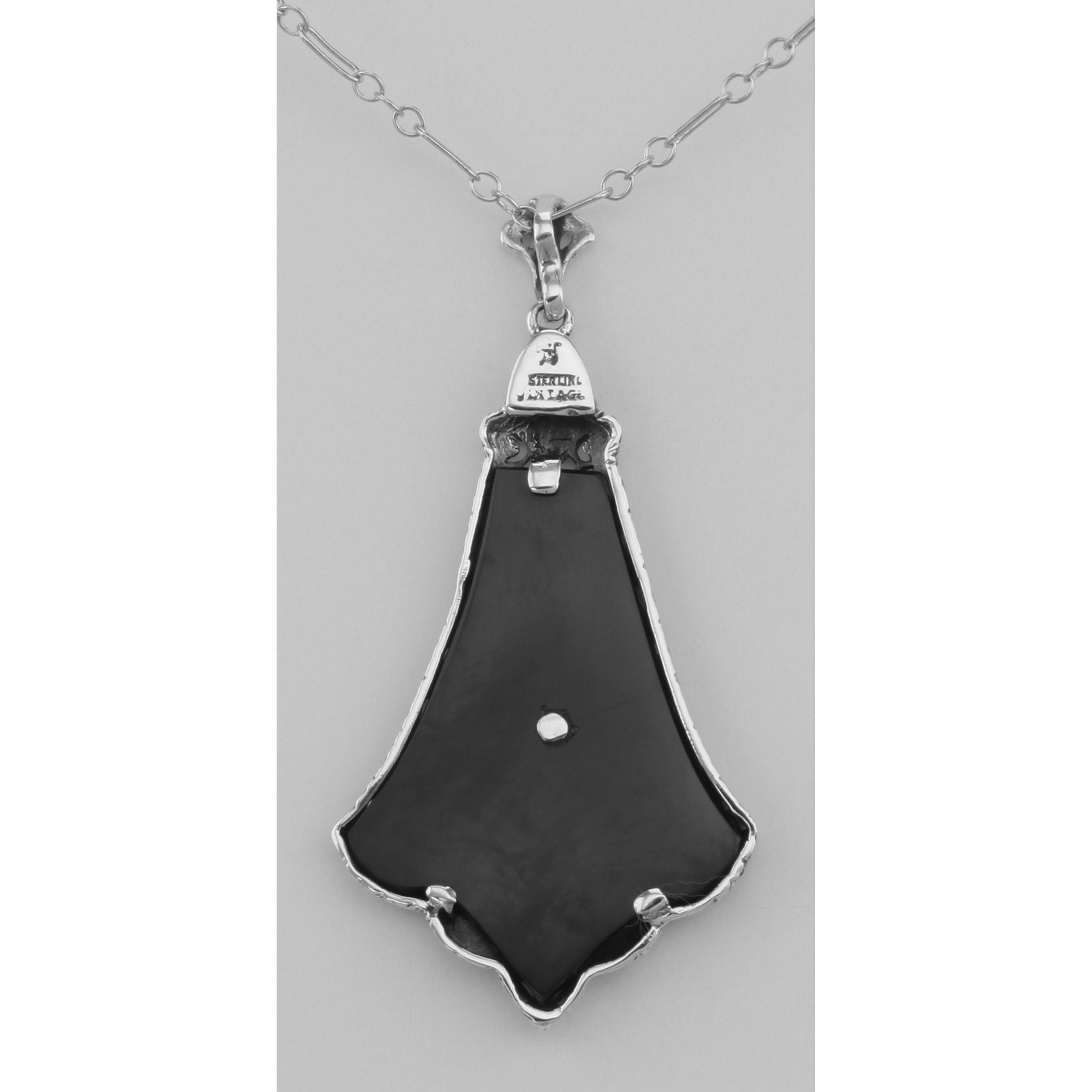 Back view of Art Deco Style Black Onyx Filigree Pendant with Diamond showing 925 sterling silver hallmark and spring ring cla