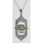 Detail view of Italian Shell Cameo / Onyx Filigree Flip Pendant highlighting Onyx