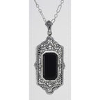 Detail view of Italian Shell Cameo / Onyx Filigree Flip Pendant highlighting Onyx