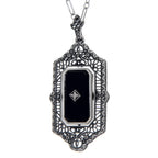 Detail view of Victorian Black Onyx or Blue Lapis Diamond Flip Pendant Sterling Silver highlighting Diamond, Black Onyx