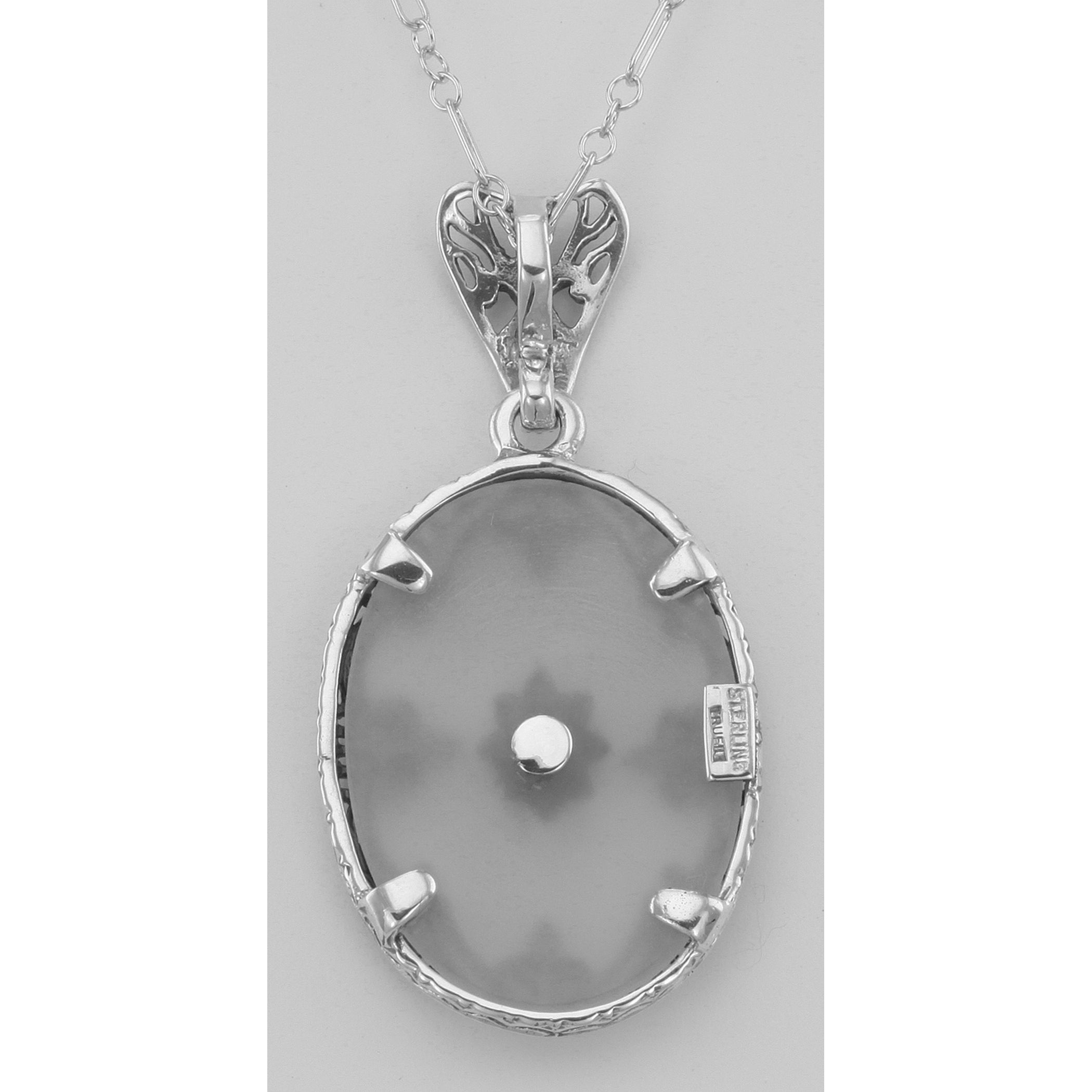 Back view of Antique Style Camphor Glass Crystal Filigree Diamond Pendant showing 925 sterling silver hallmark and spring rin