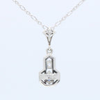 Back view of Sapphire and White Topaz Filigree Pendant showing 925 sterling silver hallmark and spring ring clasp