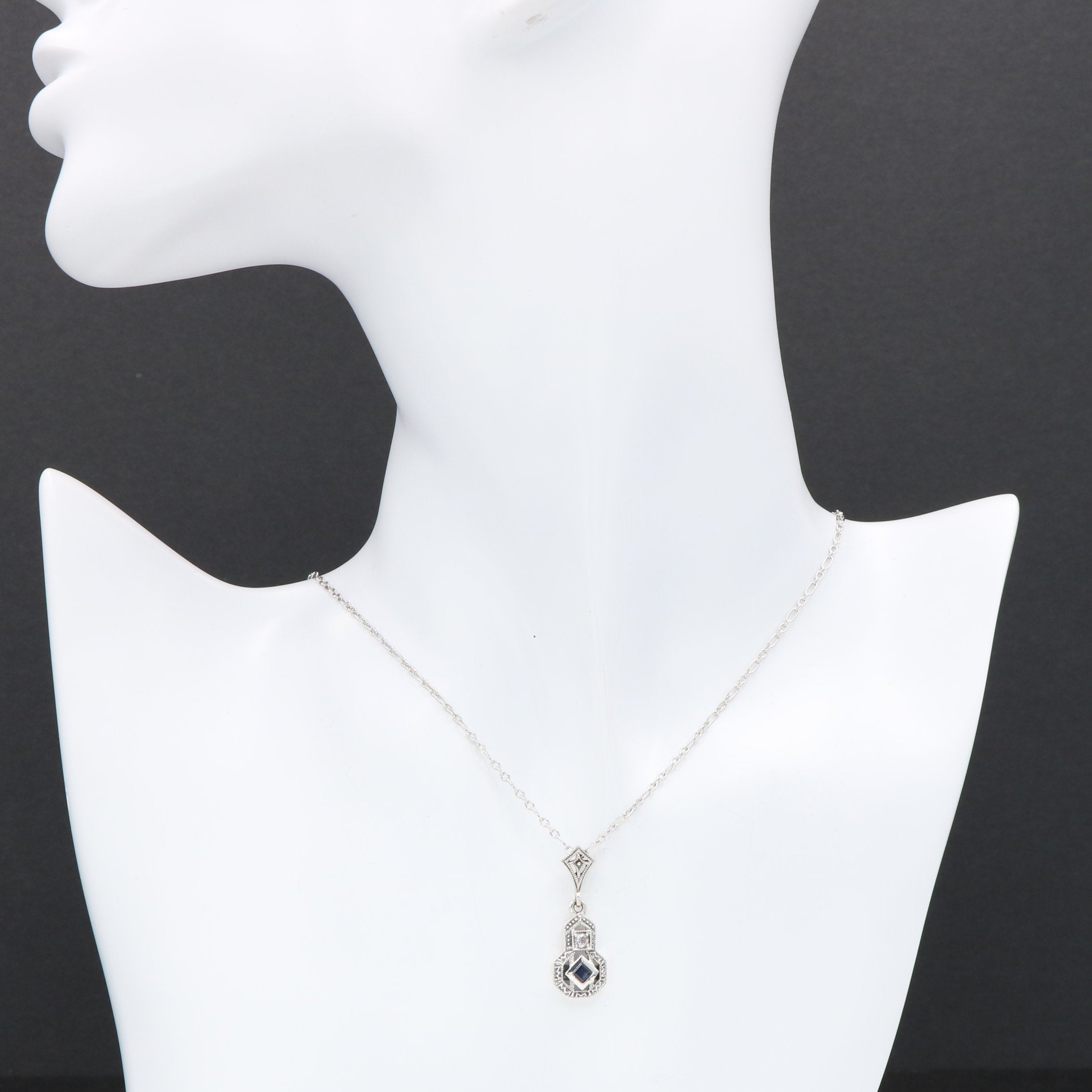 Detail view of Sapphire and White Topaz Filigree Pendant highlighting White Topaz, Sapphire