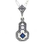 Filigree, White Topaz, Sapphire, sterling silver pendants, front view