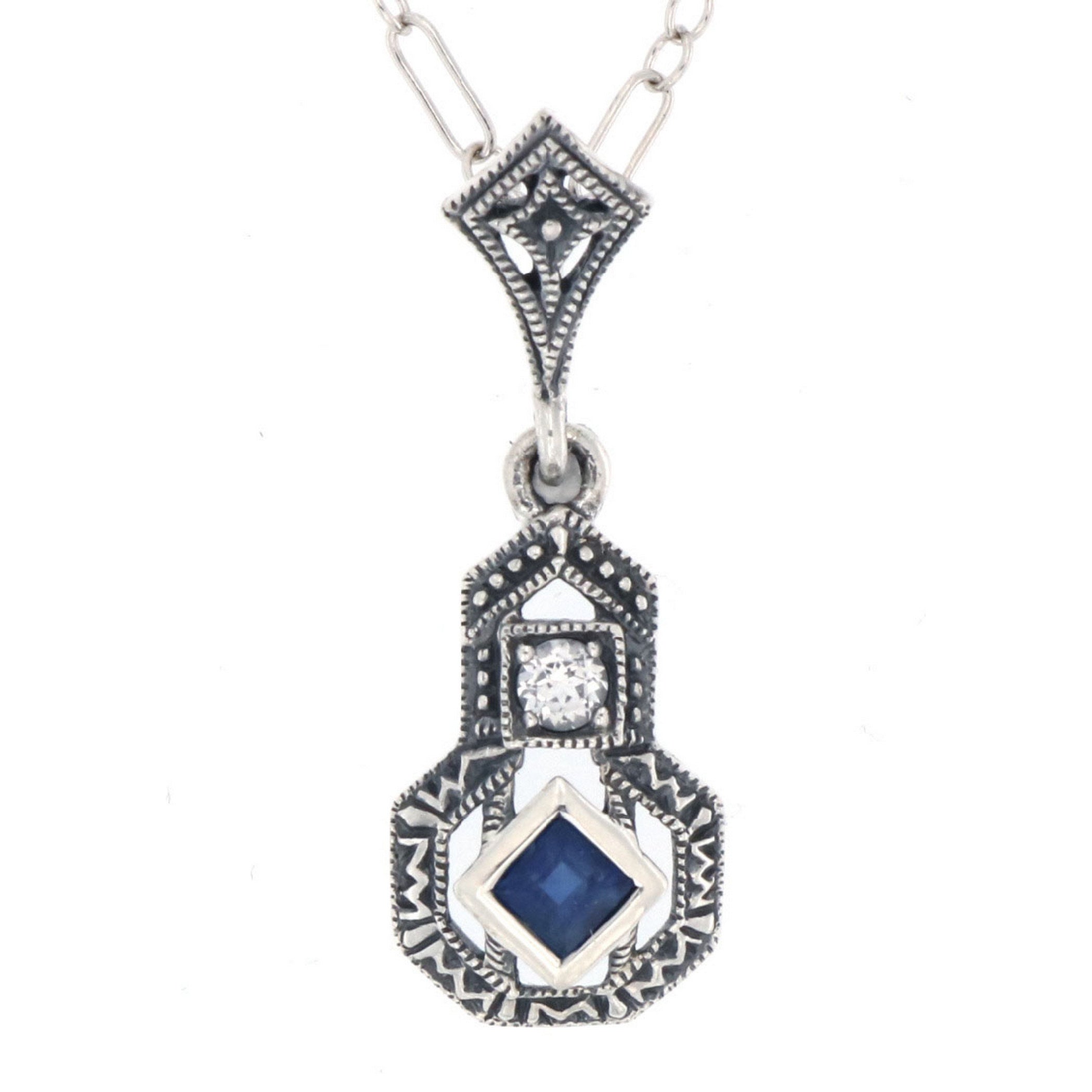 Filigree, White Topaz, Sapphire, sterling silver pendants, front view