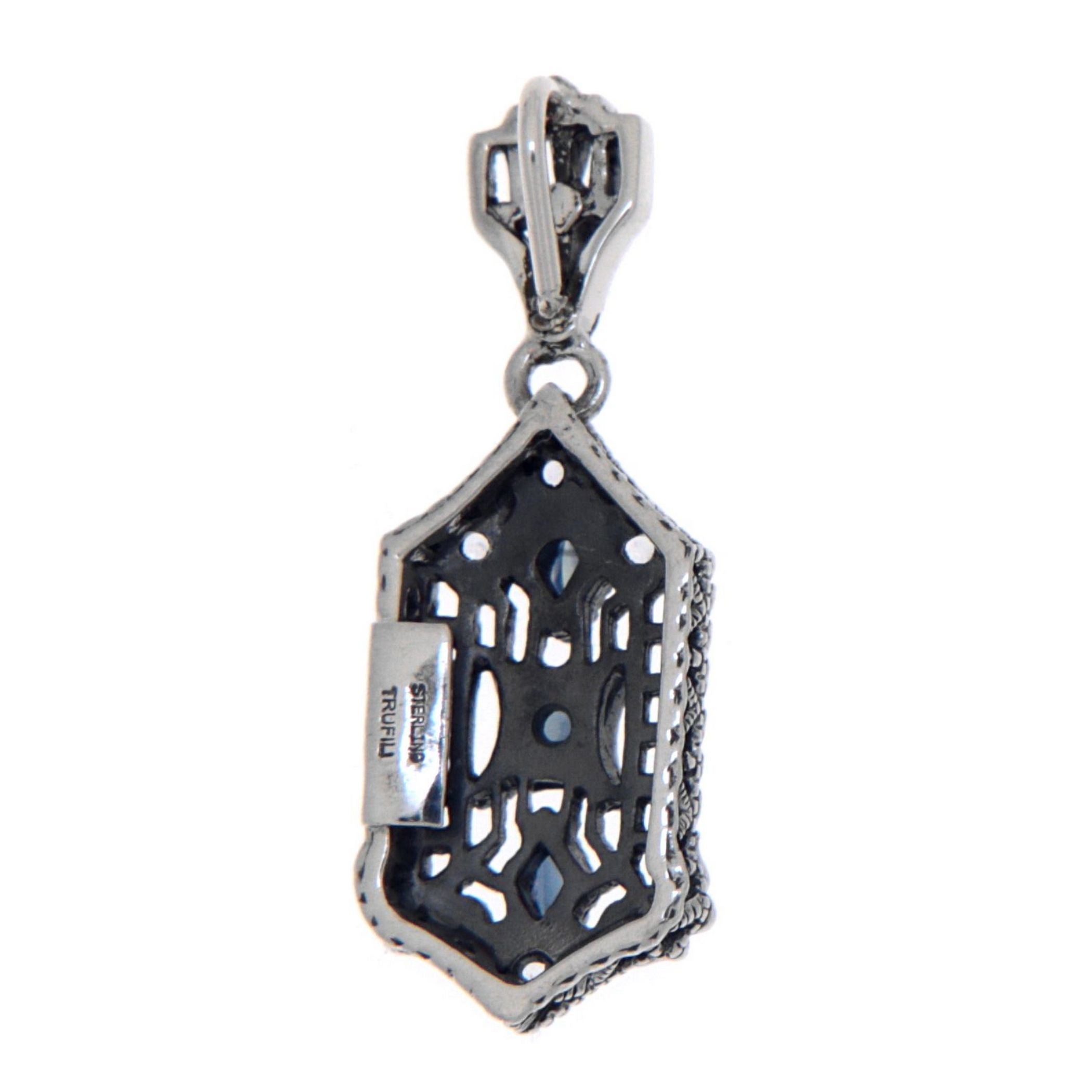 Back view of Art Deco Blue Sapphire and White Topaz Filigree Pendant showing 925 sterling silver hallmark and spring ring cla