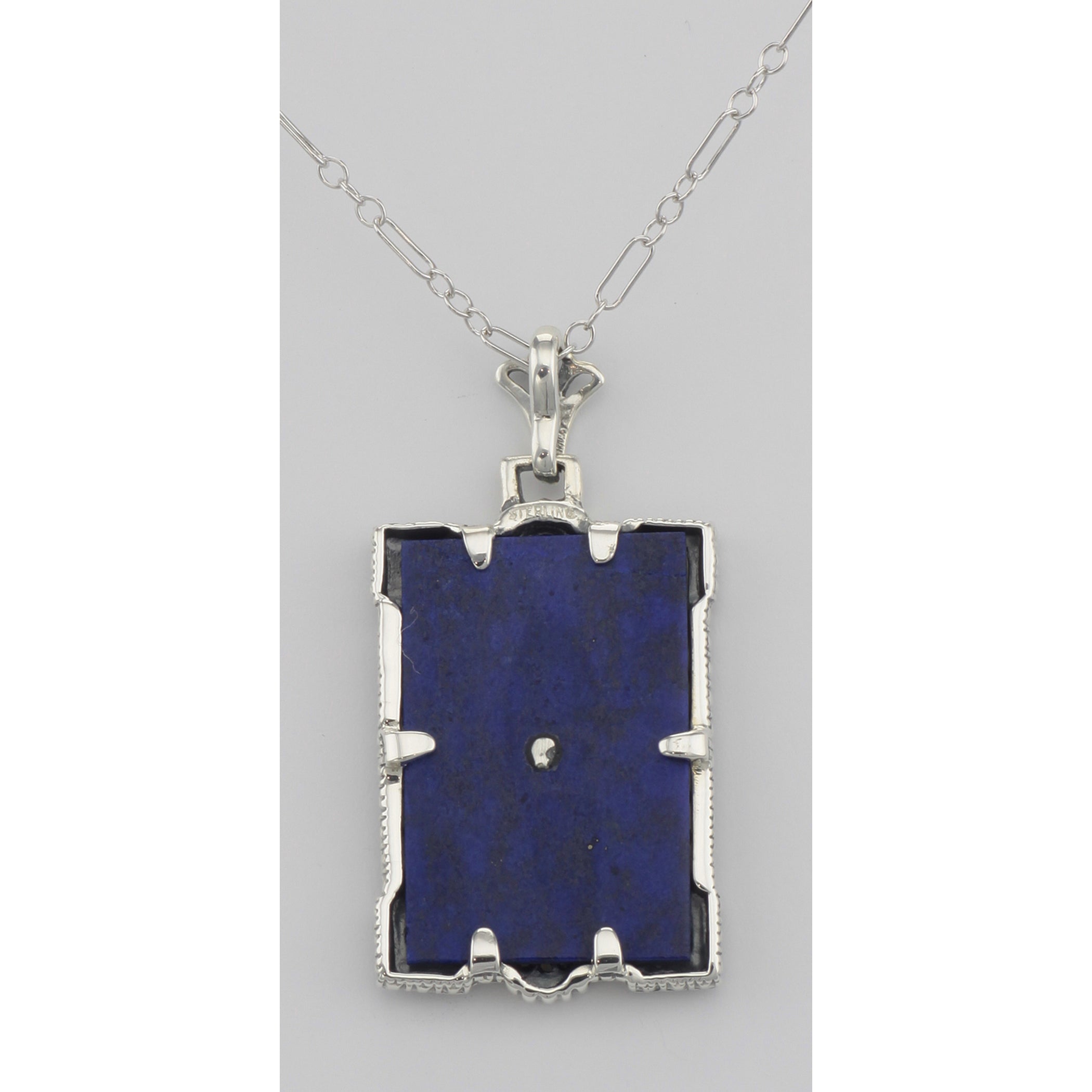 Back view of Unique Blue Lapis Filigree Pendant with Diamond showing 925 sterling silver hallmark and spring ring clasp