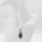 Detail view of Black Opal triplet Filigree Pendant in Sterling Silver highlighting Opal