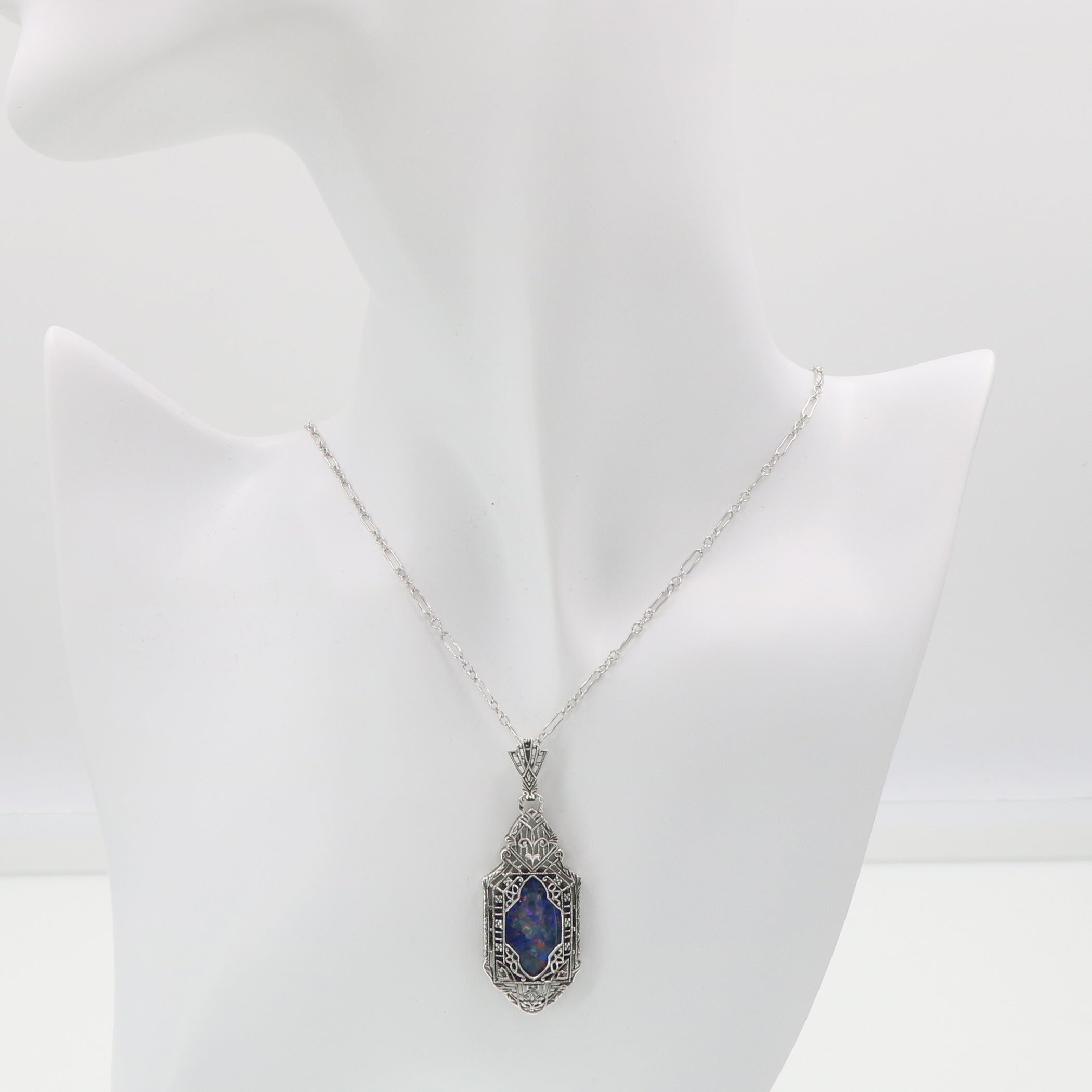 Detail view of Black Opal triplet Filigree Pendant in Sterling Silver highlighting Opal