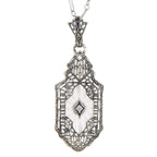 Filigree, Diamond, Camphor Glass, sterling silver pendants, front view