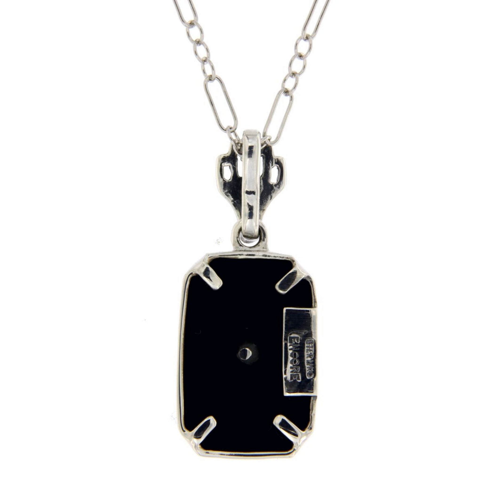 Back view of Genuine Black Onyx Filigree Pendant w/ Diamond showing 925 sterling silver hallmark and spring ring clasp