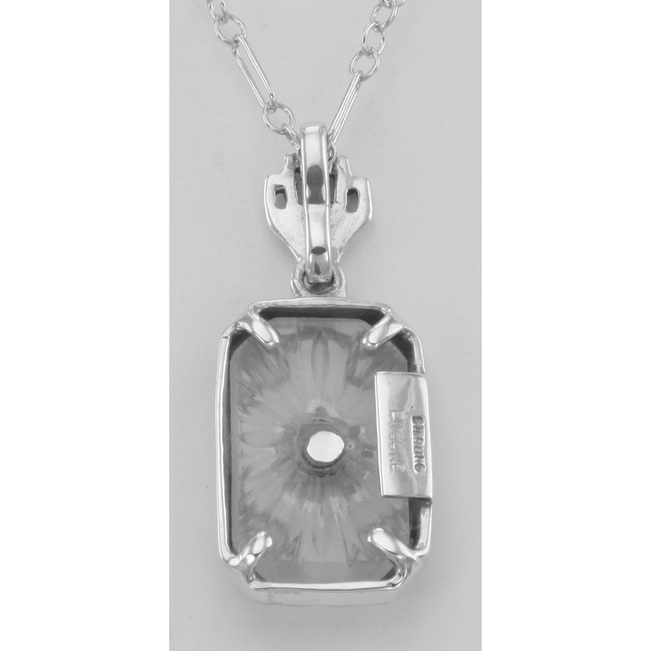 Back view of Sunray Pattern Camphor Glass / Diamond Pendant showing 925 sterling silver hallmark and spring ring clasp