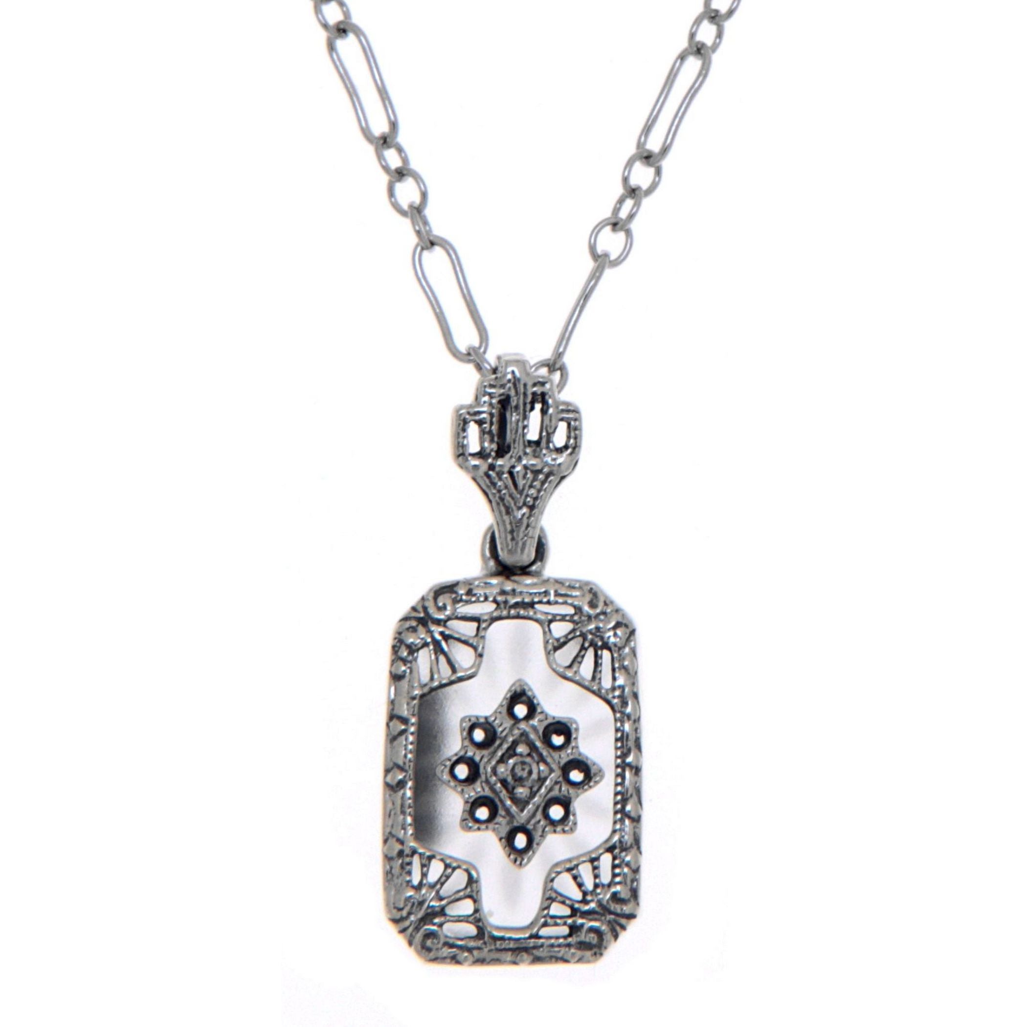 Diamond, Camphor Glass, sterling silver pendants, front view