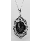 Back view of Art Deco Style Faceted Onyx Filigree Pendant showing 925 sterling silver hallmark and spring ring clasp