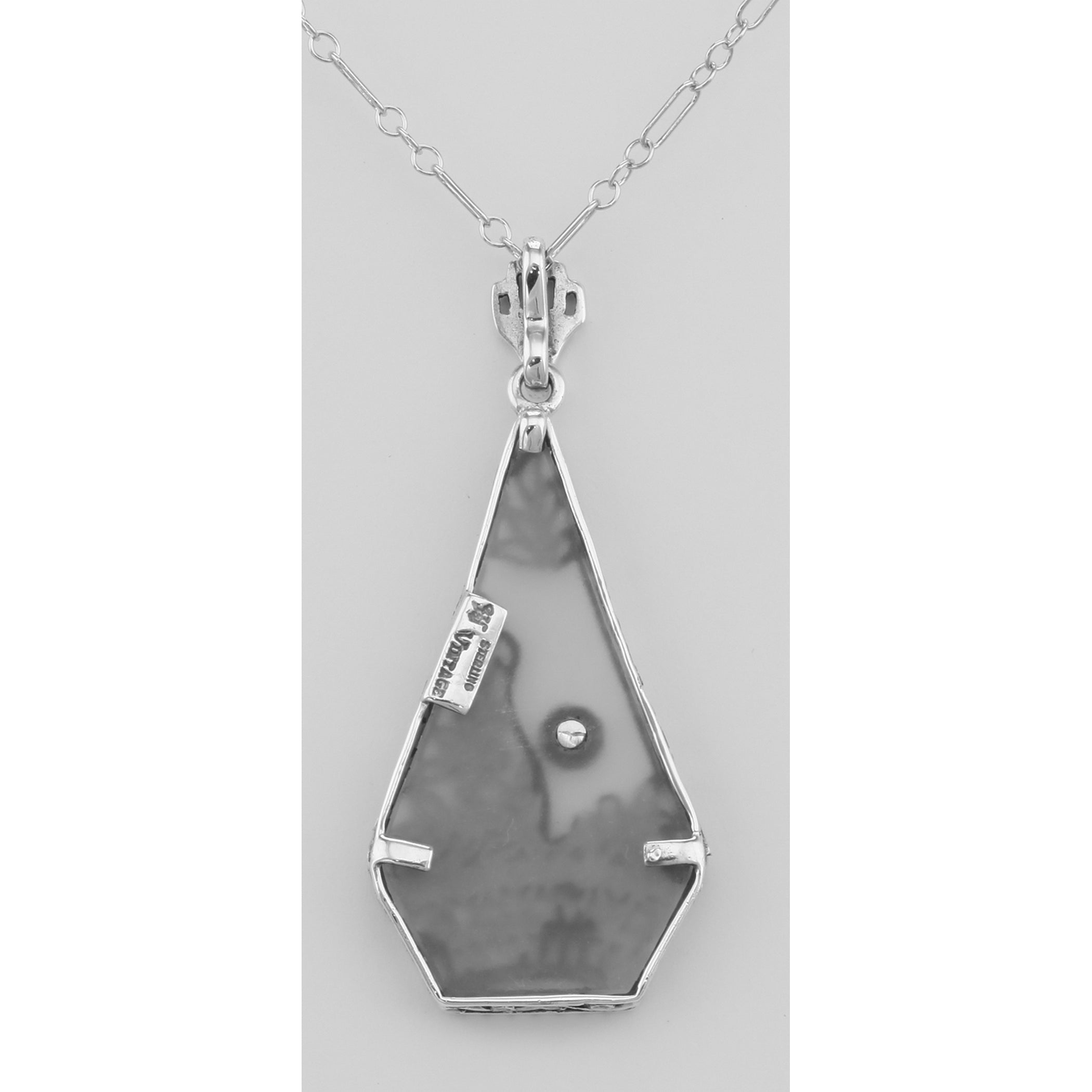 Back view of Camphor Glass Crystal Filigree Pendant w/ Diamond showing 925 sterling silver hallmark and spring ring clasp