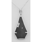 Back view of Art Deco Style Black Onyx Filigree Pendant w/ Diamond showing 925 sterling silver hallmark and spring ring clasp