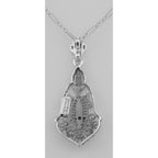 Back view of Art Deco Style Filigree Pendant w/ Blue Sapphire gemstone showing 925 sterling silver hallmark and spring ring c