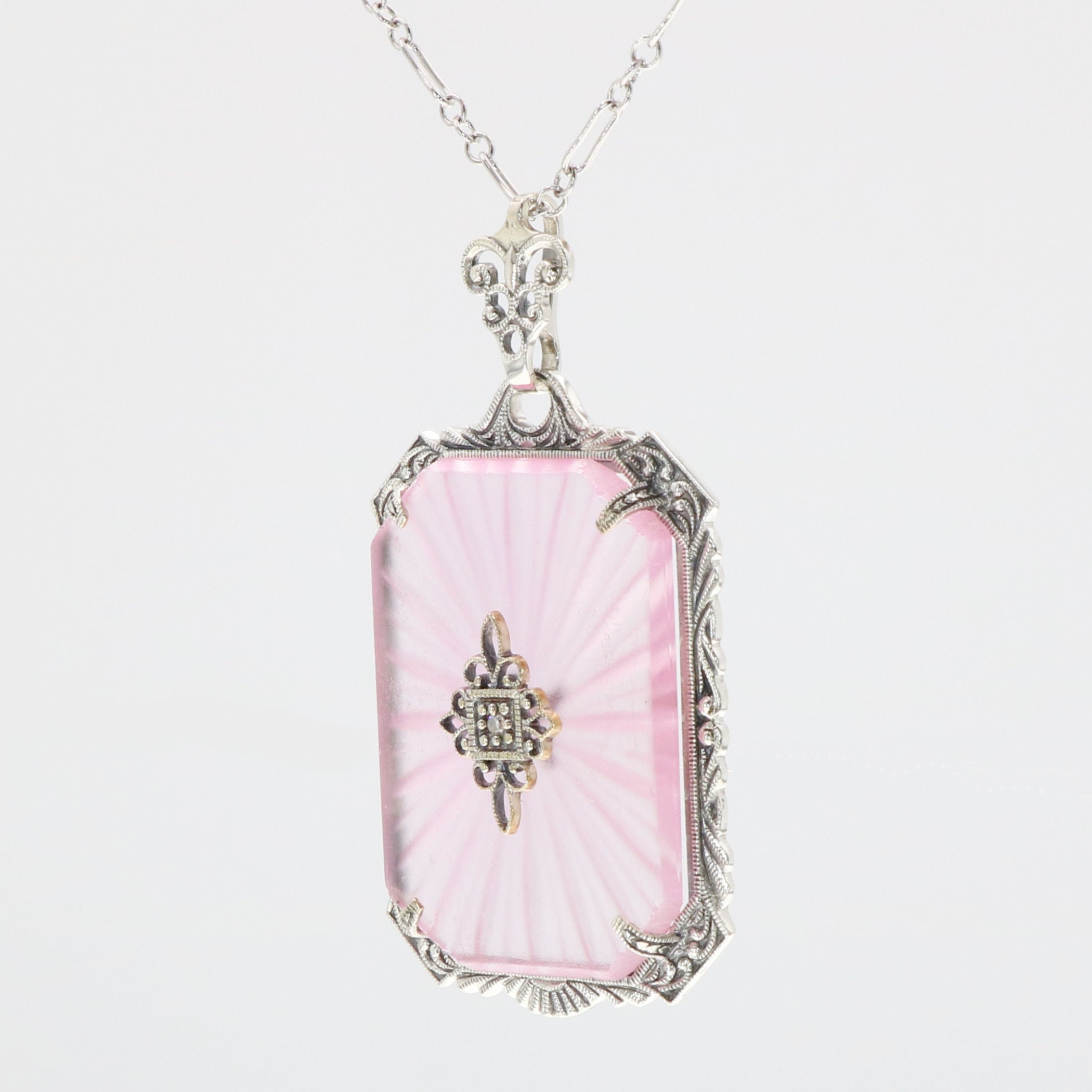 Detail view of Filigree Pendant Pink Sunray Crystal w/ Diamond Center highlighting Diamond, Crystal