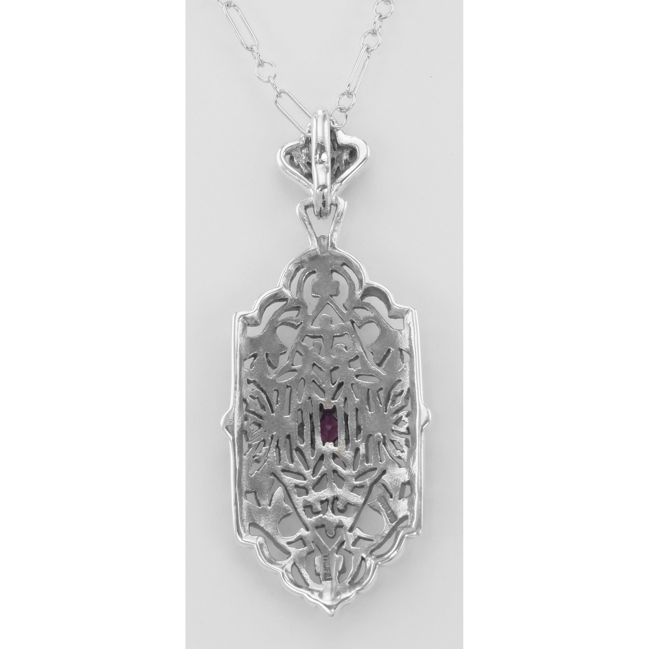 Back view of Art Deco Style Filigree Ruby Pendant showing 925 sterling silver hallmark and spring ring clasp