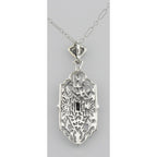 Back view of Art Deco Style Filigree Pendant w/ Blue Sapphire showing 925 sterling silver hallmark and spring ring clasp