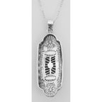 Back view of Unique Victorian Style Black Onyx Filigree Pendant w/ Diamond showing 925 sterling silver hallmark and spring ri