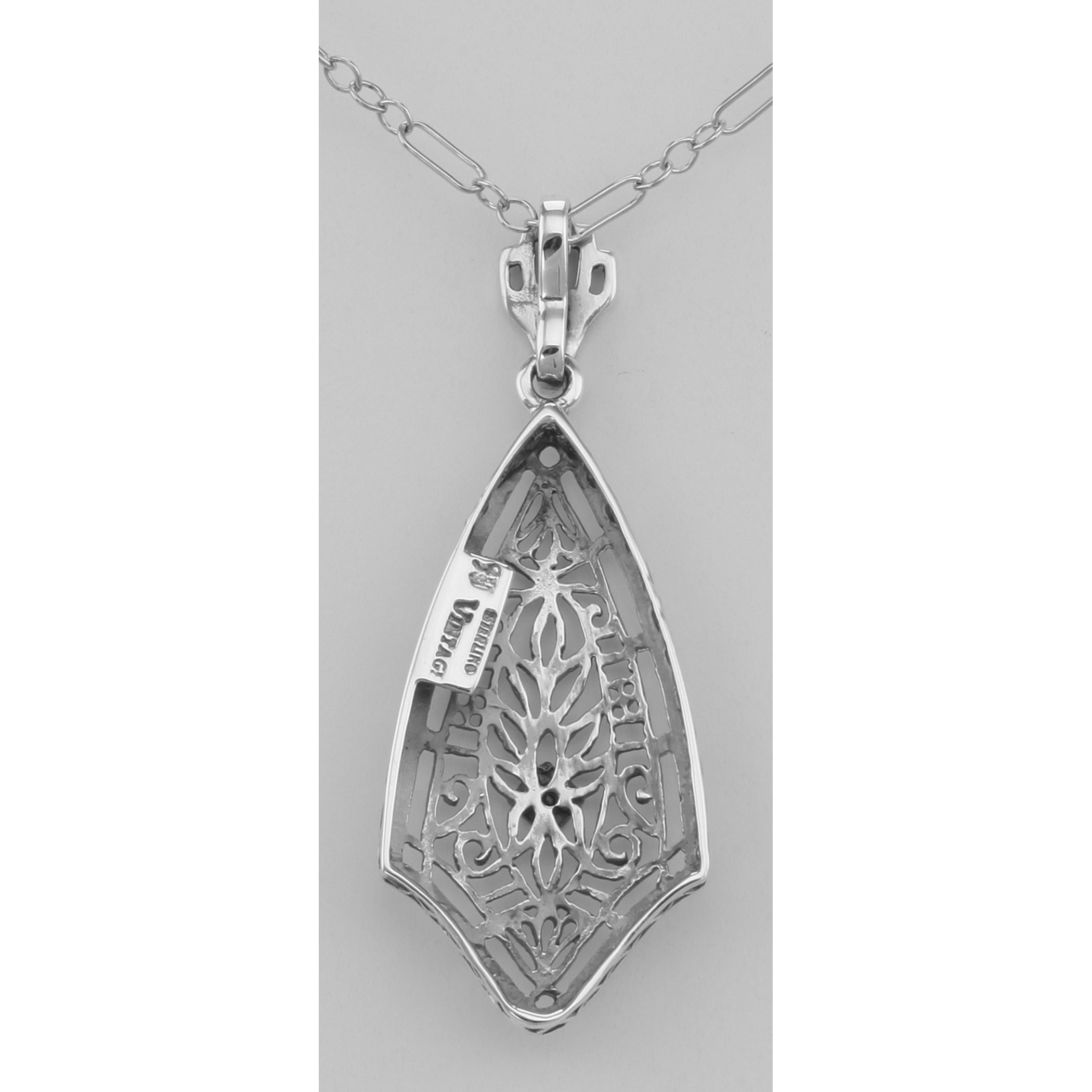 Back view of Art Deco Style Filigree Pendant w/ Diamond showing 925 sterling silver hallmark and spring ring clasp