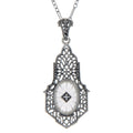 Filigree, Diamond, Camphor Glass, sterling silver pendants, front view