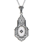 Filigree, Diamond, Camphor Glass, sterling silver pendants, front view