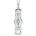 Back view of Art Deco Style Emerald and White Topaz Pendant - Sterling Silver with Chain showing 925 sterling silver hallmark
