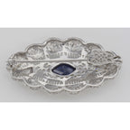 Detail view of Beautiful Syn Blue Sapphire Filigree Pin / Brooch or Pendant Sterling Silver highlighting Sapphire